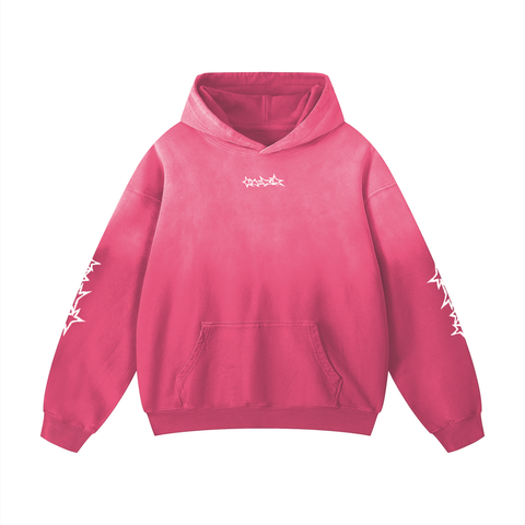Pink hoodie with white designs on a white background